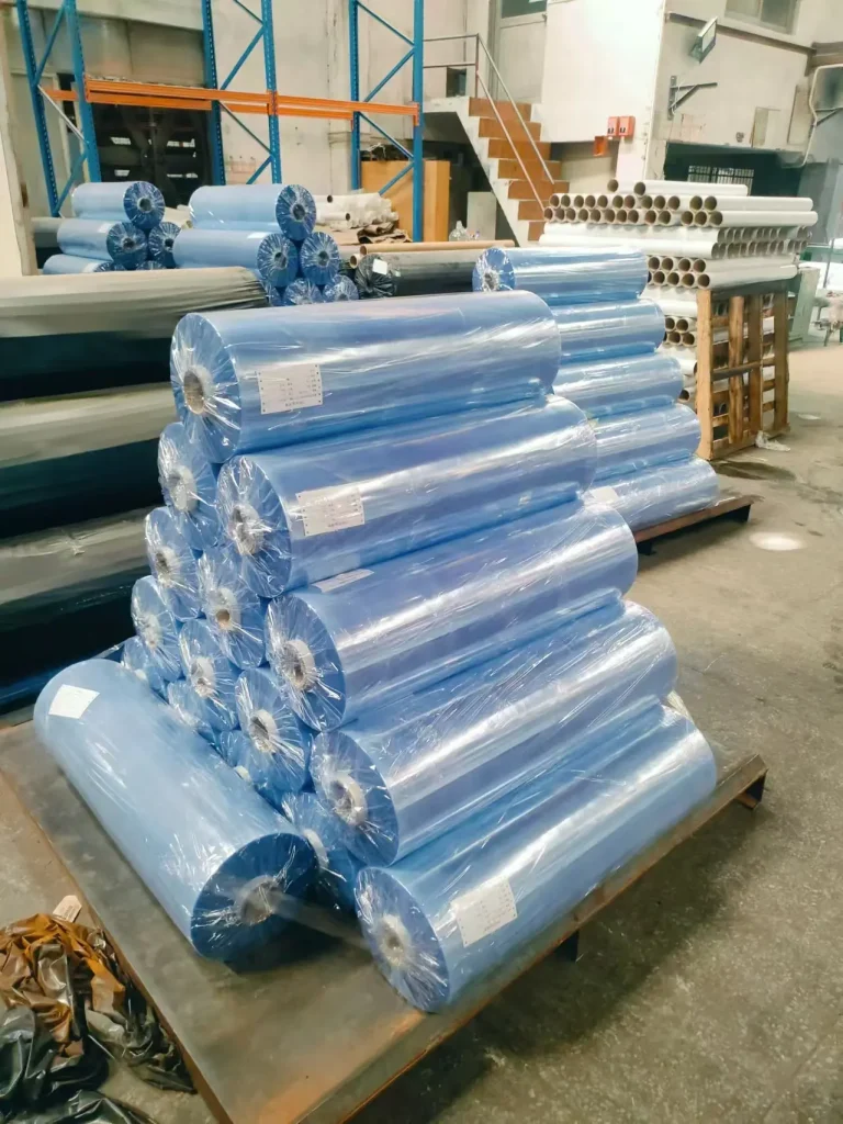 Bulk supply of normal clear pvc film rolls in factory warehouse for cost-effective packaging